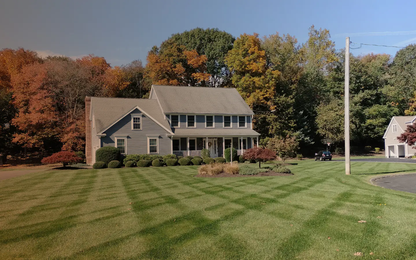 exterior view of a house after a lawn care work shelton ct